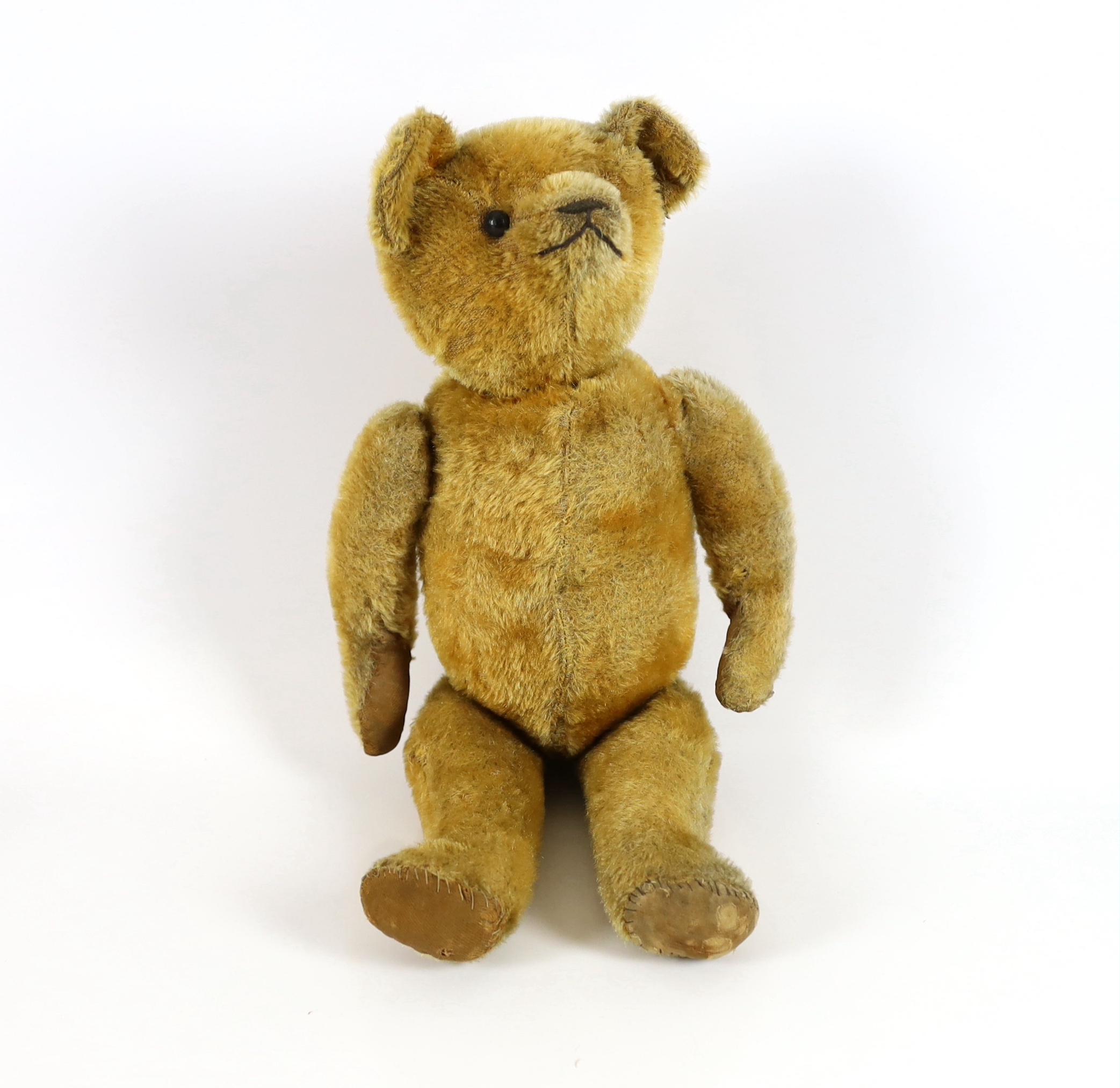 An early bear, possibly American c.1913, 40cm, in good condition, old repairs to paws